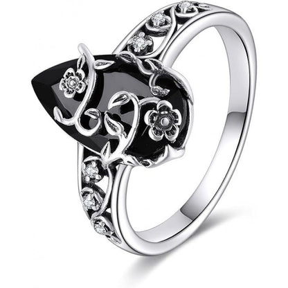 💍60% DE DESCONTO AGORA! 🌿 Anel com motivo floral vintage – Pedra preta em forma de lágrima, detalhes brilhantes e banda com aberturas ✨