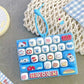 Chaveiro com botões de teclado fofos – Brinquedo anti-stress